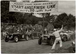 MG’s driven by C. G. Bennett, car 50; Norman Carlson, car 66; Virginia Schleicher, car 96; and Robert McManus, car 108 lead the start of the 1952 Kimberly Cup.